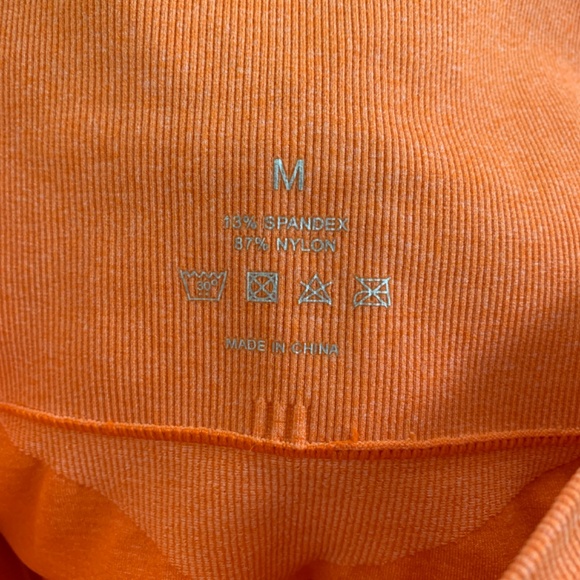 NWOT NVGTN SEAMLESS CONTOUR LEGGINGS ORANGE M - Picture 4 of 5